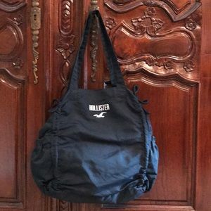 Purse/Bag - by Hollester. Dark Blue Color w/string